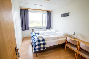 Postel nebo postele na pokoji v ubytování The Nest