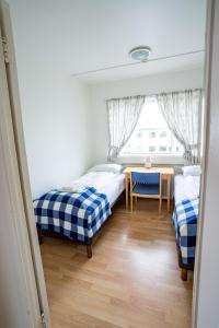 Postel nebo postele na pokoji v ubytování The Nest