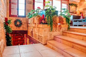 Fotografie z fotogalerie ubytování Farmhouse Cala v destinaci Qala
