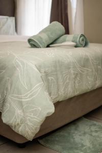 Postel nebo postele na pokoji v ubytování Making Memories Apartment + 26 fotografií