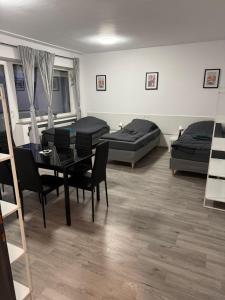 Ruang duduk di Zentrale Monteurwohnung Ferienwohnung Recklinghausen 6 Personen