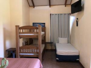 Letto o letti in una camera di Hotel Cocodrilo Sierpe