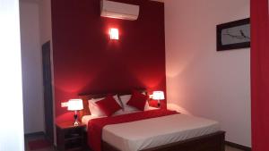 Postel nebo postele na pokoji v ubytování New Rani Inn