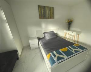 Newly built modern flat with free parking close to London Luton airport and L&D hospital客房内的一张或多张床位
