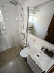 Koupelna v ubytování Apartments ZB