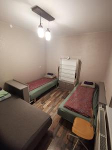 Postel nebo postele na pokoji v ubytování Alejas KAMBARI