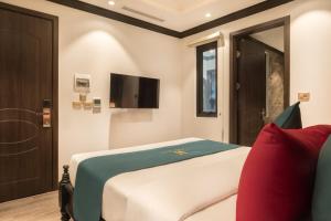 TV a/nebo společenská místnost v ubytování Hanoi Bliss Hotel