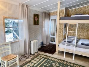 Voodi või voodid majutusasutuse The Tiny House toas