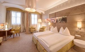 Posteľ alebo postele v izbe v ubytovaní Hotel Mader