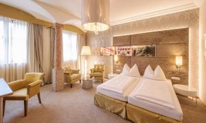 Posteľ alebo postele v izbe v ubytovaní Hotel Mader
