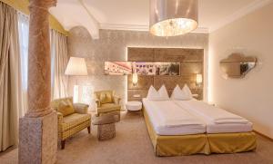 Posteľ alebo postele v izbe v ubytovaní Hotel Mader