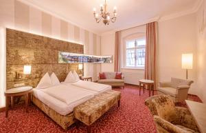 Posteľ alebo postele v izbe v ubytovaní Hotel Mader