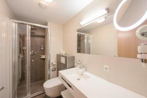 Kúpeľňa v ubytovaní Hotel Mader + 37 fotografií