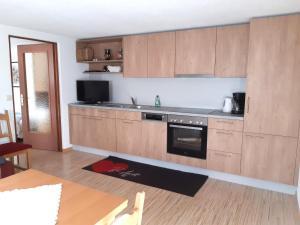 Kuchyň nebo kuchyňský kout v ubytování Apartment Marina