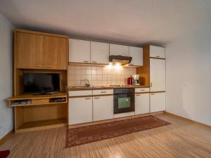 Kuchyň nebo kuchyňský kout v ubytování Apartment Marina