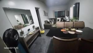 a living room with a couch and a table at Apartamento em ótima localização in Manaus