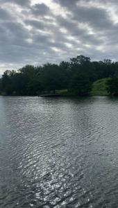 a large body of water with trees in the background at Brand New Home in Moor in Moore