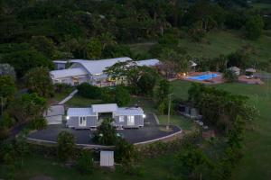 an aerial view of a house with a pool at Paradis Sur Terre Ocean View Fiji Villa for 12 with 2 Private Pools in Lauwaki +47 photos