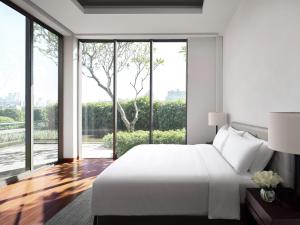 Postel nebo postele na pokoji v ubytování Cordis, Foshan, Lingnan Tiandi - Free Shuttle Bus to Canton Fair