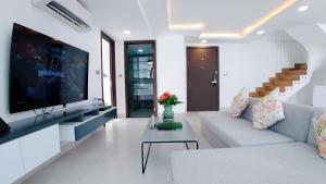 TV a/nebo společenská místnost v ubytování Noden Hotel & Apartment
