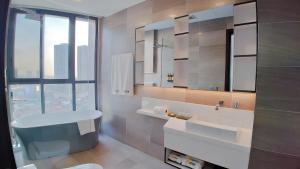 Koupelna v ubytování Noden Hotel & Apartment