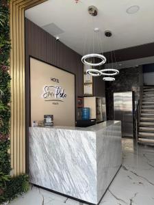 a lobby with a reception desk in a building at HOTEL SAN PEDRO PITALITO in Pitalito