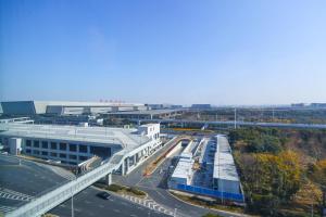 an aerial view of a building and a highway at Hyatt House Shanghai Hongqiao CBD in Shanghai