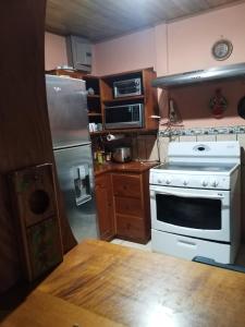 Kuchyň nebo kuchyňský kout v ubytování La posada Escondida