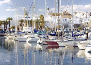 a group of boats docked in a harbor at BeSlow Ayamonte in Ayamonte
