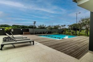 Kolam renang di atau dekat dengan Executive studio w Aircon DA -The Millennial Umhlanga