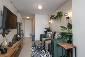 Televisyen dan/atau pusat hiburan di Executive studio w Aircon DA -The Millennial Umhlanga