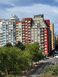 a group of tall buildings in a city at Olimpo Apartment 6 Frente al mar-Plaza Colon solo familias! in Mar del Plata