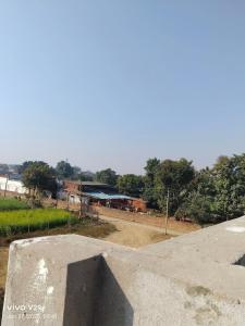 a skateboard ramp with a skate park in the background at S K Home Stay in Allahābād