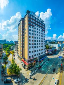 an overhead view of a large building in a city at Wansheng Hotel in Jingxi
