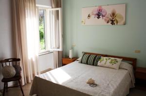 Postel nebo postele na pokoji v ubytování Hotel Holiday Bambù