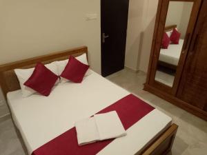 Ένα ή περισσότερα κρεβάτια σε δωμάτιο στο MercuryFM 112 House - 32 Vivekananda Road Colombo-06 -4-4