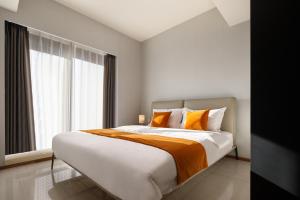 Ліжко або ліжка в номері Dayu Apartment Century City Branch