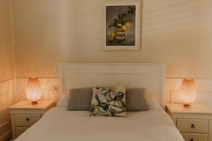 Ένα ή περισσότερα κρεβάτια σε δωμάτιο στο Dwellingup Retreat