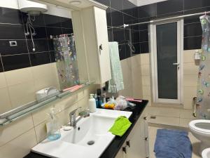 Koupelna v ubytování Andis House