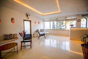 Posezení v ubytování Çamlık 87 Hotel Ayvalık