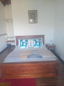 Postel nebo postele na pokoji v ubytování Kadalla Cottage