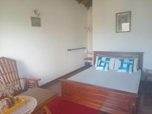 Postel nebo postele na pokoji v ubytování Kadalla Cottage