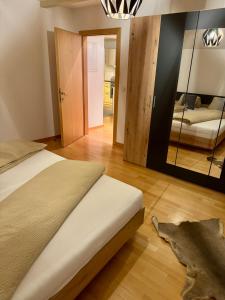 Postel nebo postele na pokoji v ubytování Rieder Stubn Lodge