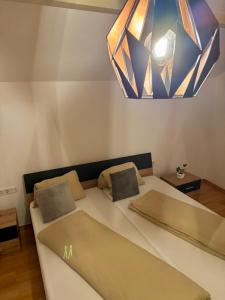 Postel nebo postele na pokoji v ubytování Rieder Stubn Lodge