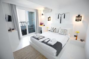 Postel nebo postele na pokoji v ubytování Çamlık 87 Hotel Ayvalık