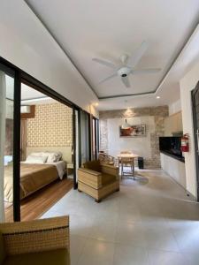 Katil atau katil-katil dalam bilik di Muaya Villa