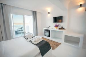 Postel nebo postele na pokoji v ubytování Çamlık 87 Hotel Ayvalık