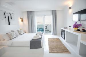Postel nebo postele na pokoji v ubytování Çamlık 87 Hotel Ayvalık