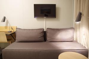 TV a/nebo společenská místnost v ubytování Hamarøy Hotel