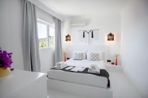 Postel nebo postele na pokoji v ubytování Çamlık 87 Hotel Ayvalık